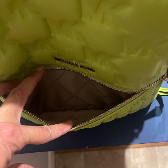 Gently used in excellent condition Michael Kors neon green back pack purse. - Picture 6 of 8